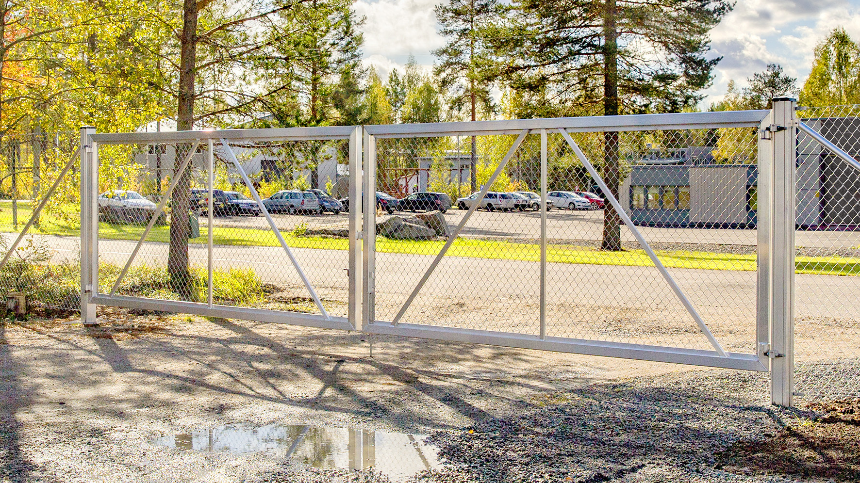 1 - Panssariaidan portit Ajoportti 2-lehtinen korkeus 2000mm aukko 4m